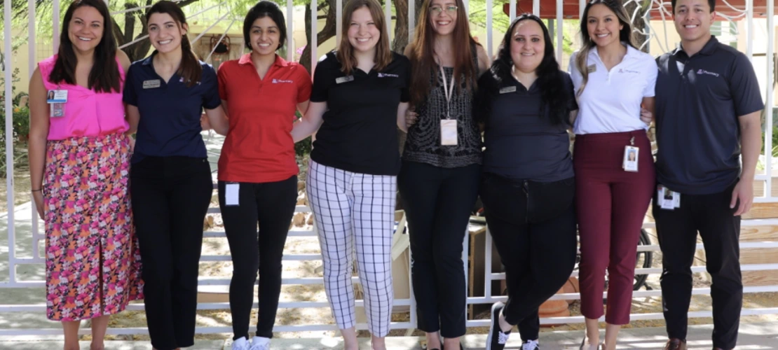 A group of consultant pharmacists and students