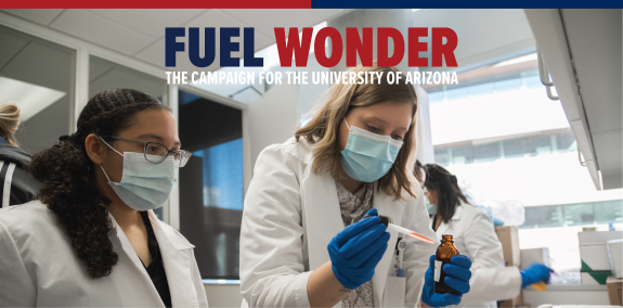 Fuel Wonder Graphic | Two women pipetting liquids into a medicine bottle. 