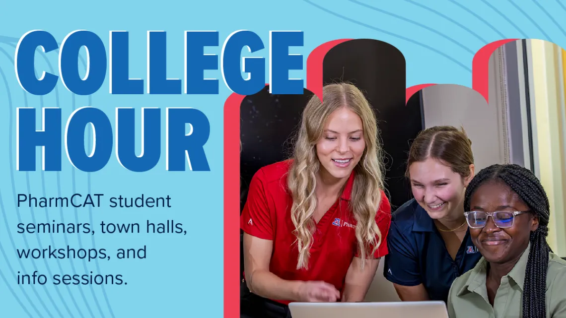 College students look at computer.