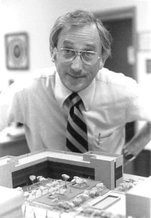 Dr. Jack Cole with Skaggs building model.
